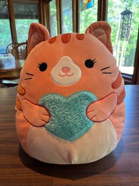 Squishmallows Orange Cat Plush with Teal Heart